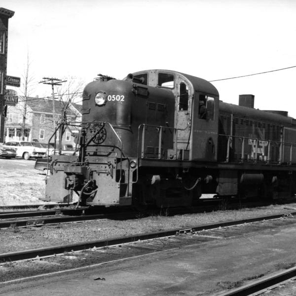 Engineer's side view of DERS-2b #0502  (RS-2) in Taunton, in front of Mason's Supply
