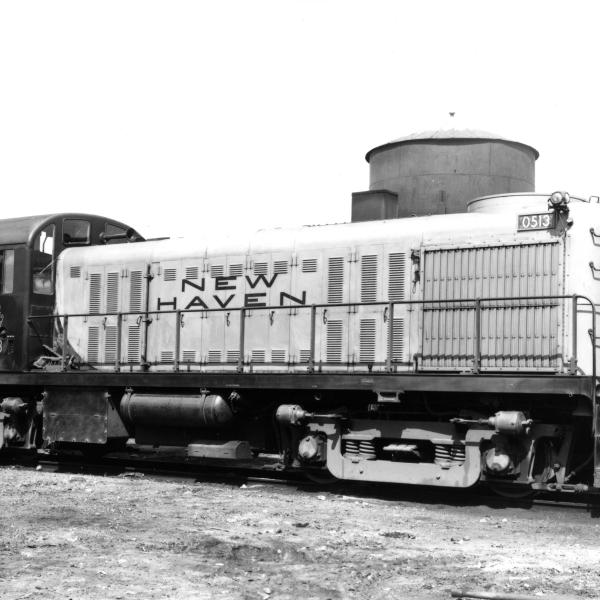 Broadside View of the engineer's side of RS-2 number 0513 with diesel locomotives in the background